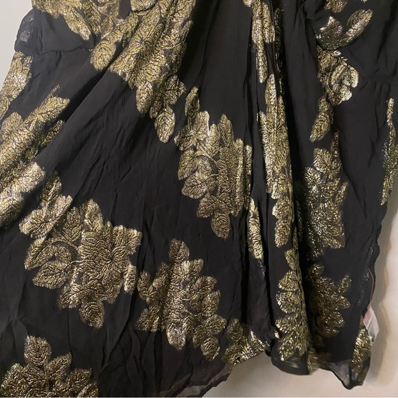 ASOS DESIGN Curve Metallic Frill Mini Dress With Lace Up  Neck In Black Pattern - Picture 8 of 14